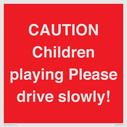 caution-children-playing-please-drive-slowly~